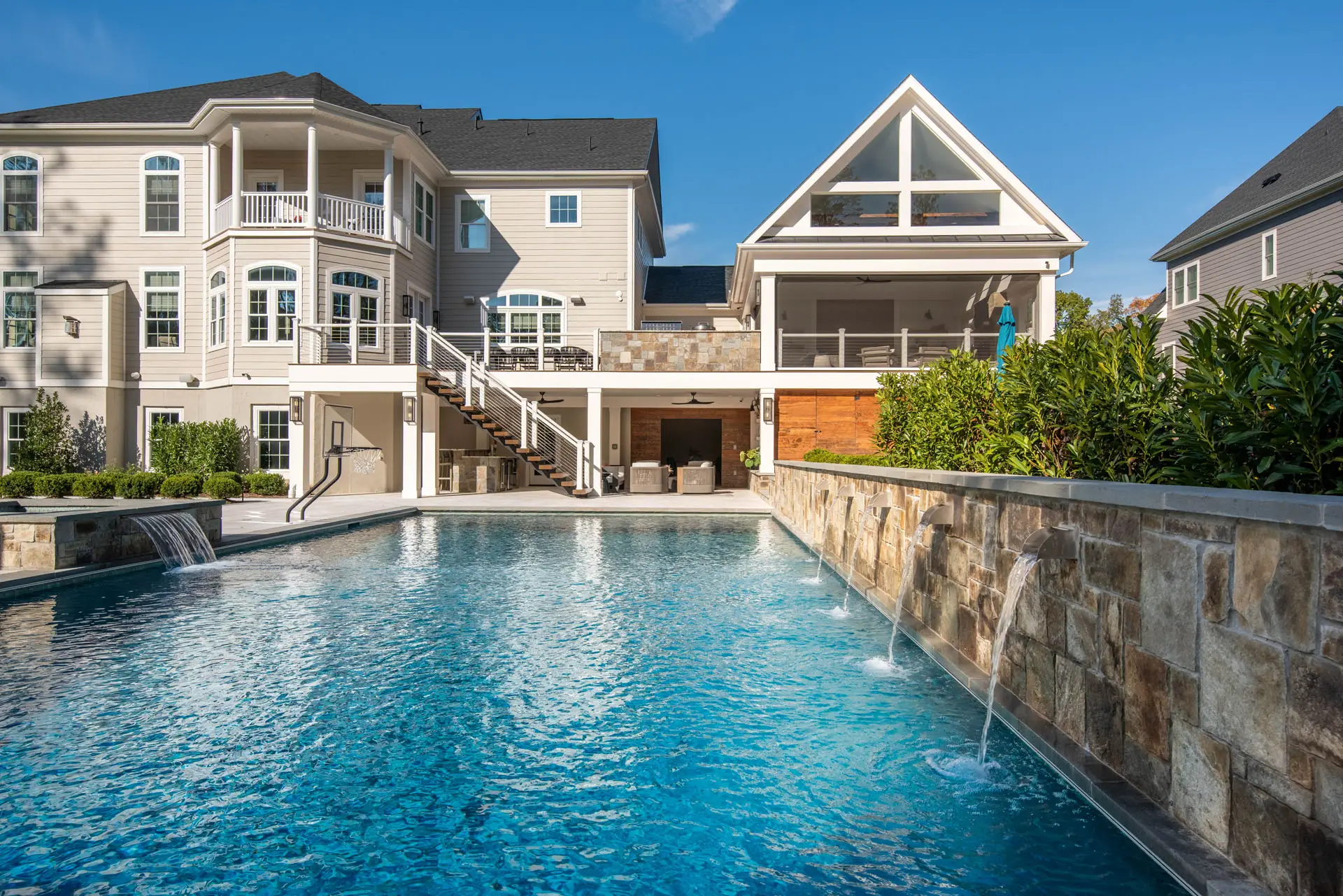 end of the pool view of house