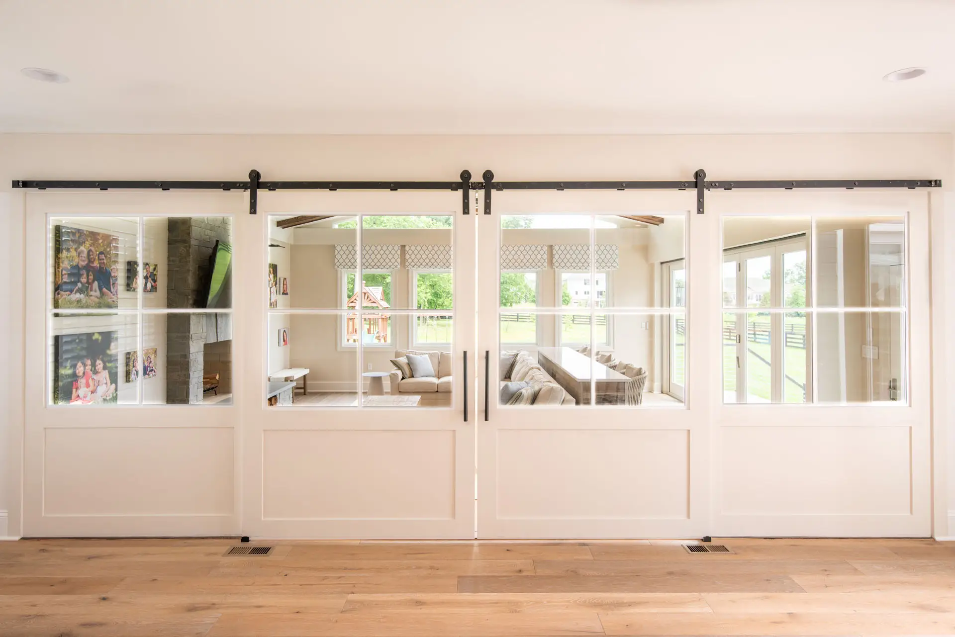 closed barn doors into sun room