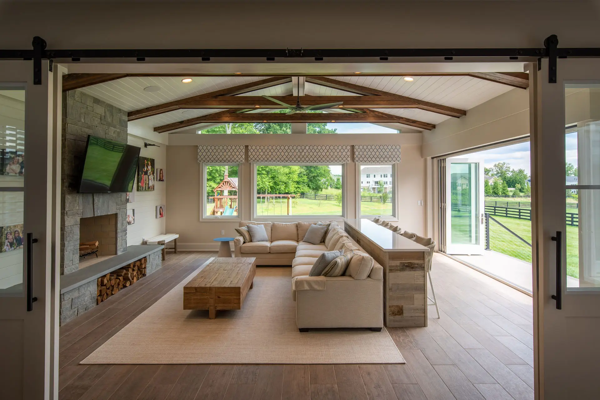 sunroom with open bifold doors